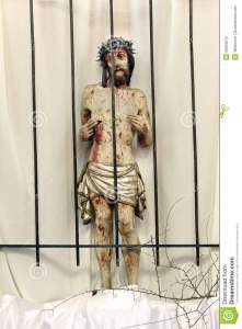 jesus-behind-bars-prison-wooden-figure-jesus-churc-church-easter-39923275